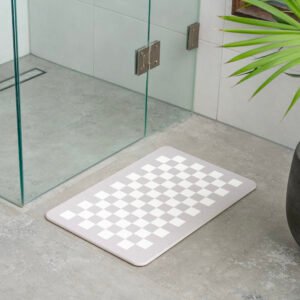 TubTreasures Premium diatomaceous earth Bath mat infront of a shower